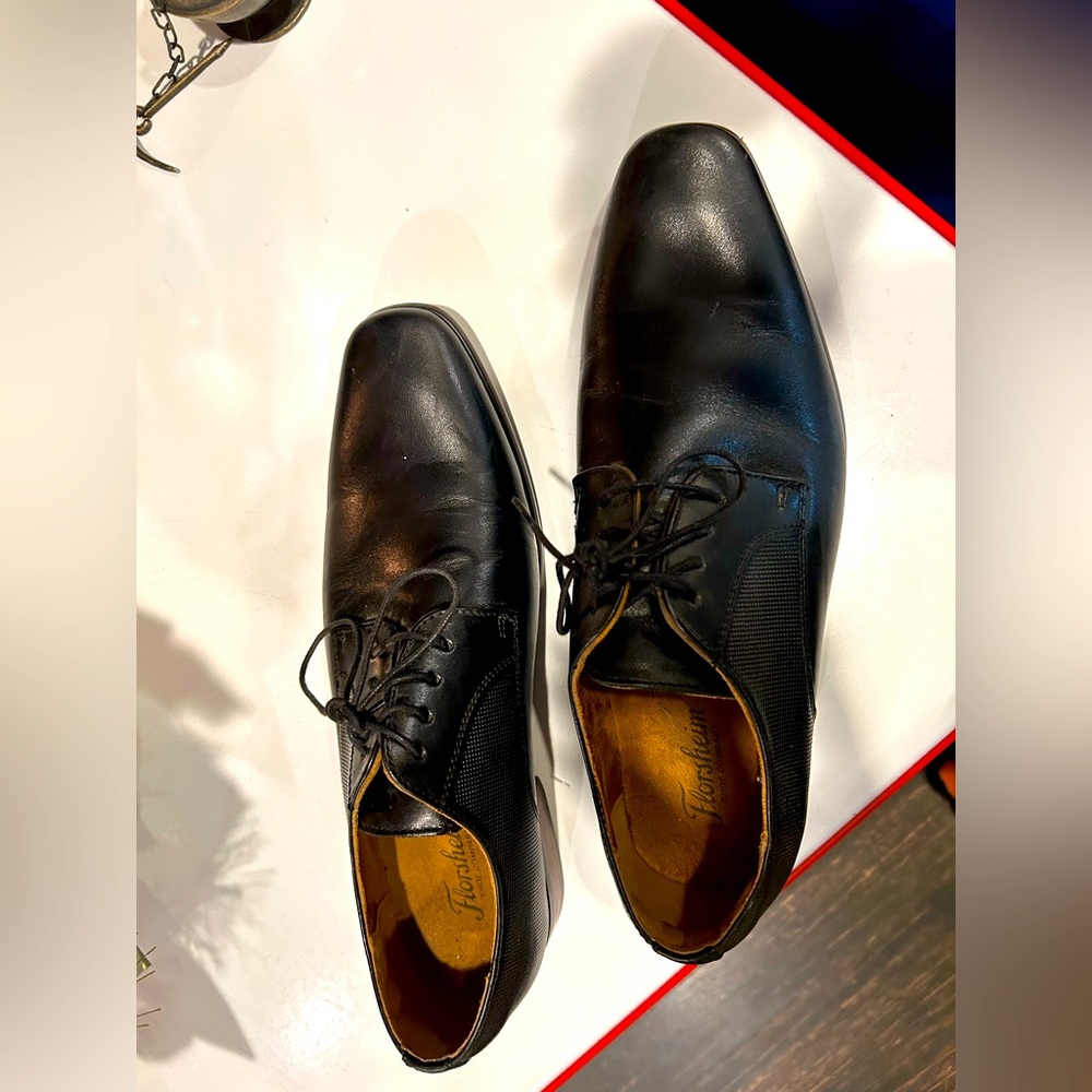 Florsheim men’s shoes, size 8.5. Black leather. Practically new. Worn once.